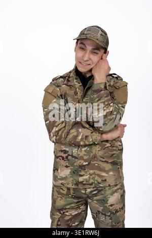 Soldier in camouflage looking thoughtful Stock Photo