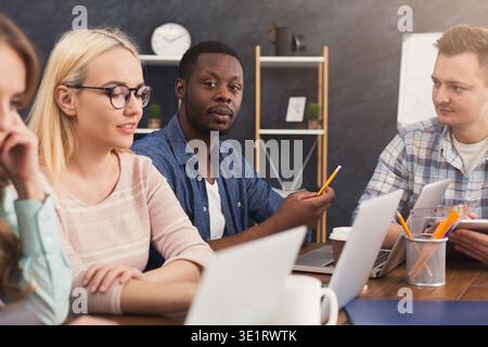 Programmers working in software developing company Stock Photo