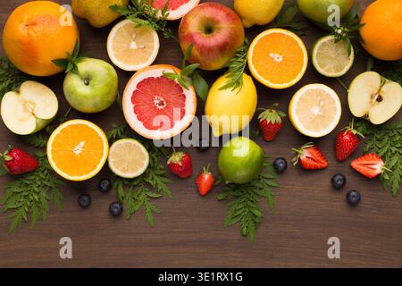 Summer fruit and berries assortment on wooden background Stock Photo