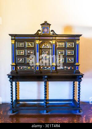Cabinet in ebony with flowers and birds Florentine Grand-Ducal workshop late 17th - early 18th century, inlaid with semi-precious stones and gilt in the Room of Jupiter of the Apartments of the Elements - Palazzo Vecchio - Florence, Italy Stock Photo