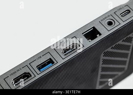 Explore the HDMI and USB ports on this sleek device showcasing connectivity options Stock Photo