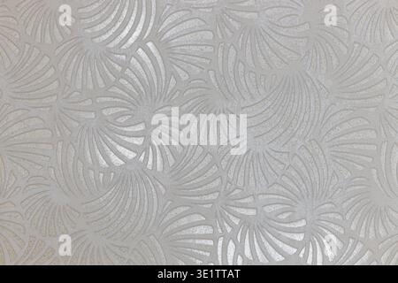 Textured grey fabric with an elegant fan pattern wallpaper design Stock Photo