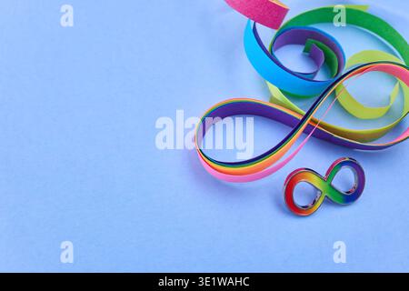 Rainbow infinity symbol representing neurodiversity and autism awareness Stock Photo