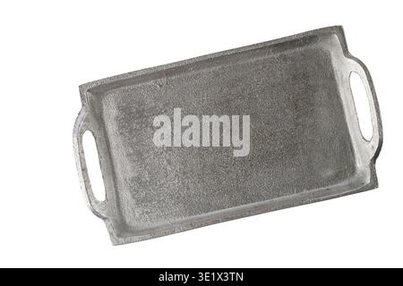Empty aged silver color metallic tray isolated on white background. Grunge tray top view Stock Photo