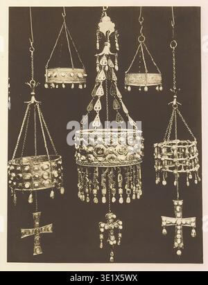 Crown of Reccesvinthus and other Gothic crowns of the seventh century - Intricate Byzantine crown pendants and crosses, richly embellished with pearls and jewels, showcasing ancient religious artistry and opulent ecclesiastical treasures. from The book of the pearl the history, art, science, and industry of the queen of gems by Kunz, George Frederick, 1856-1932 Published 1908 Stock Photo