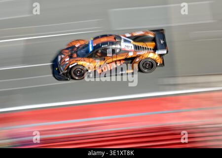 UAE, Dubai, 18 January 2026: 24h series racing supercars on the circuit, Battle of the teams, long exposure photography, supercars drive past at high Stock Photo