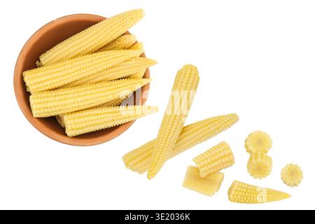 Pickled young baby corn cobs in wooden bowl isolated on white background. Top view. Flat lay Stock Photo