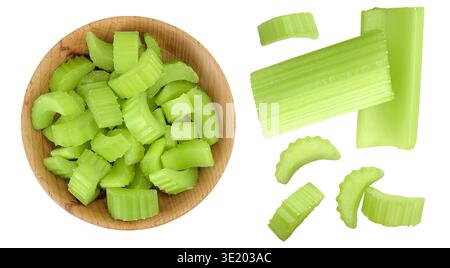 fresh celery in wooden bowl isolated on white background. Top view. Flat lay Stock Photo