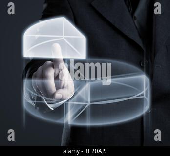 Businessman navigating data in pie chart on futuristic touchscreen display Stock Photo