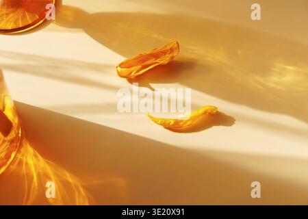 Sunlight Refraction Through Amber Glass with Yellow Petals Stock Photo