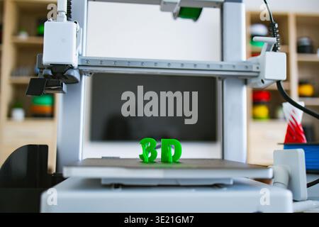 3D Printer Creating Letters Stock Photo