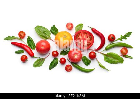 Creative vegetables art composition on white background Stock Photo