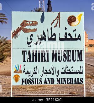 Rissani, morocco, january 7, 2026: hand-painted sign displaying information about the tahiri museum and its collection of fossils and minerals Stock Photo