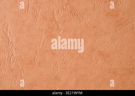 Leather look cardboard texture with warm natural surface background Stock Photo