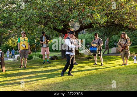 Evening light on live music in the gardens beside the Palace Hotel at Buxton, Derbyshire, England UK Stock Photo