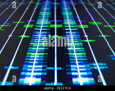 Visual depiction of digital DNA sequence data with vivid blue and green patterns. Stock Photo