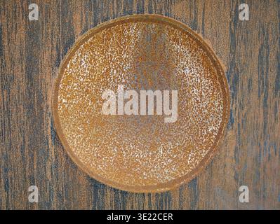 rusty metal plate with circular texture pattern Stock Photo