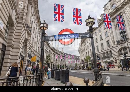 London cityscape with Underground sign and flags. London, UK, 21 May 2023 Stock Photo