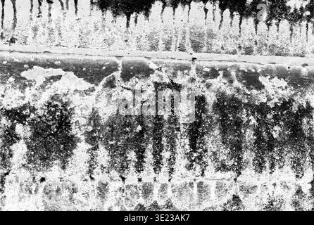 Aged concrete grunge texture creates a rough industrial background. Cracked stained surface shows gritty scratches dirt and weathered noise. Abstract Stock Photo