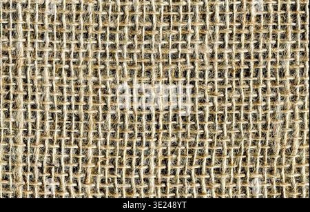 Natural sacking burlap background. Natural light brown burlap fabric texture. Sackcloth woven texture background Stock Photo