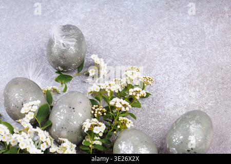 Easter eggs and spring flowers minimal composition Stock Photo