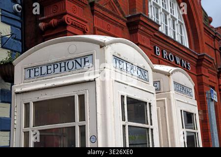 Cream KCOM telephone kiosks in Beverley town centre, East Riding of Yorkshire, England, in front of Browns department store. Stock Photo