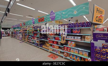 Variety of Easter Chocolate Eggs on Supermarket Shelves Stock Photo