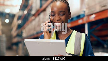 Phone call, clipboard and black woman in warehouse for inventory, inspection or stock checklist. Supervisor, factory and person on smartphone for Stock Photo