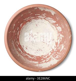 empty plastic cup or bowl with dried white paint residue isolated white background, used plastic container for cleanup, top view with shadows Stock Photo
