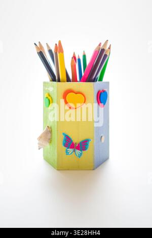 Handmade Decorated Wooden Pencil Holder with Colorful Pencils Isolated on White Stock Photo