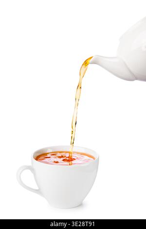 White cup of tea with teapot filling, isolated on white background. Stock Photo