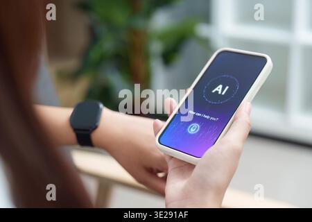 AI Assistance. User engaging with AI on smartphone for support. Stock Photo
