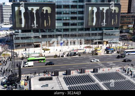 Workers prepare for a comeback concert of K-pop band BTS at Gwanghwamun ...