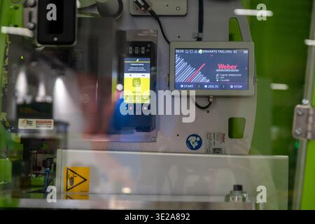 Helsinki, Finland - March 11, 2026: A detailed view of two digital control panels displaying operational information and a low ribbon warning for a We Stock Photo