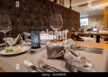 Fine dining table setting in boutique hotel restaurant, Zermatt Stock Photo