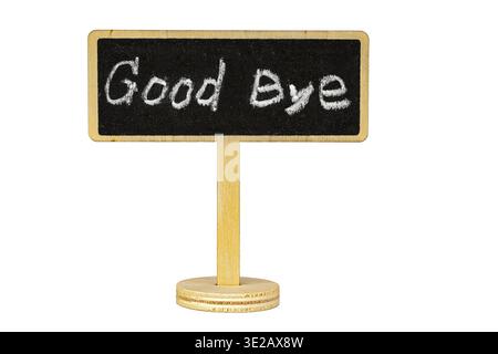 Small decorative blackboard sign with handwritten Good Bye text in white chalk, mounted on a rustic wooden stand with circular base, isolated on white Stock Photo