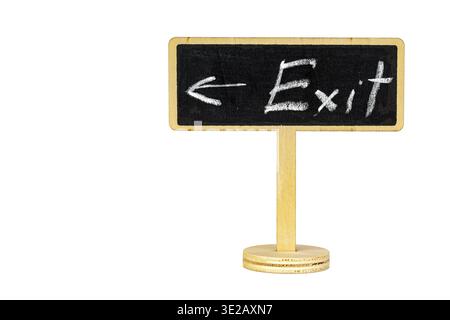 A charming handwritten chalk Exit sign with a left arrow on a black blackboard framed in wood, isolated on a white background with generous copy space Stock Photo