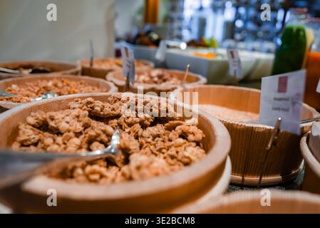 Breakfast buffet with labeled granola bowls in Oberlech, Austria Stock Photo