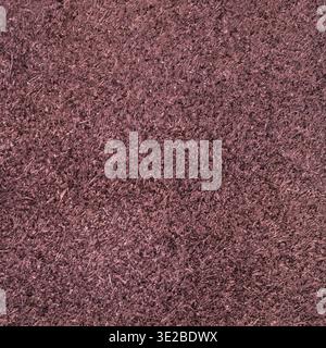 Textured square background from maroon brown suede close up Stock Photo
