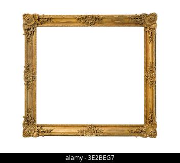 Old ornamental wooden picture frame with cut out canvas isolated on white background Stock Photo