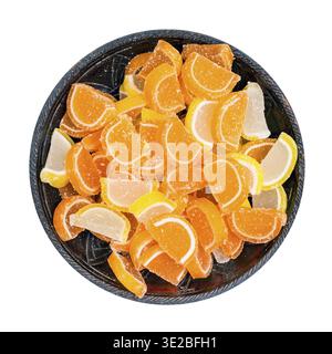 Top view of sweet sugar lemon and orange marmalade slices in ceramic bowl isolated on white background Stock Photo