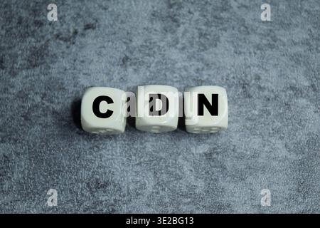 Concept of text CDN - Content Delivery Network on wooden blocks. Stock Photo
