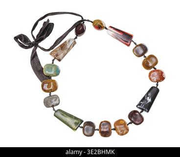 Top view of necklace from various hand made ceramic beads isolated on white background Stock Photo