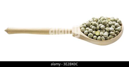 Wooden spoon with whole dried green peas isolated on white background Stock Photo