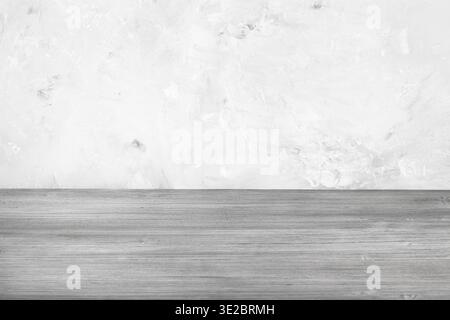 Gray wooden floor and gray concrete wall (focus on wooden planks near wall on background) Stock Photo