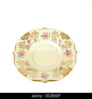 The elegant scalloped edges and vibrant hand-painted roses evoke a sense of Victorian sophistication and nostalgia. Perfect for interior design Stock Photo