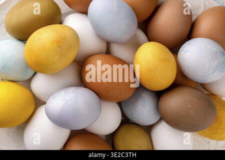 Modern natural dyed easter eggs. Happy Easter. Congratulatory easter background Stock Photo