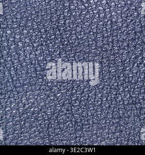 Textured square background from dark navy blue leather close up Stock Photo