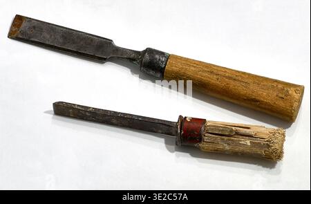 Two old chisels on a white background. Woodworking tool. Stock Photo