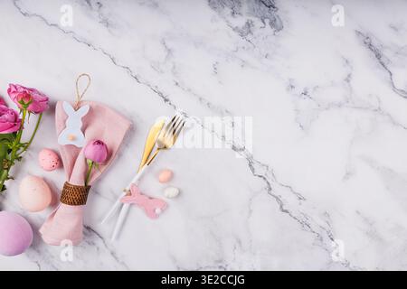 Flat Lay of Easter Table Setting and Spring Flowers Stock Photo